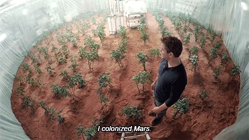 A screen shot from the Martian where Mark Watney says "I colonized Mars" after growing potatoes.